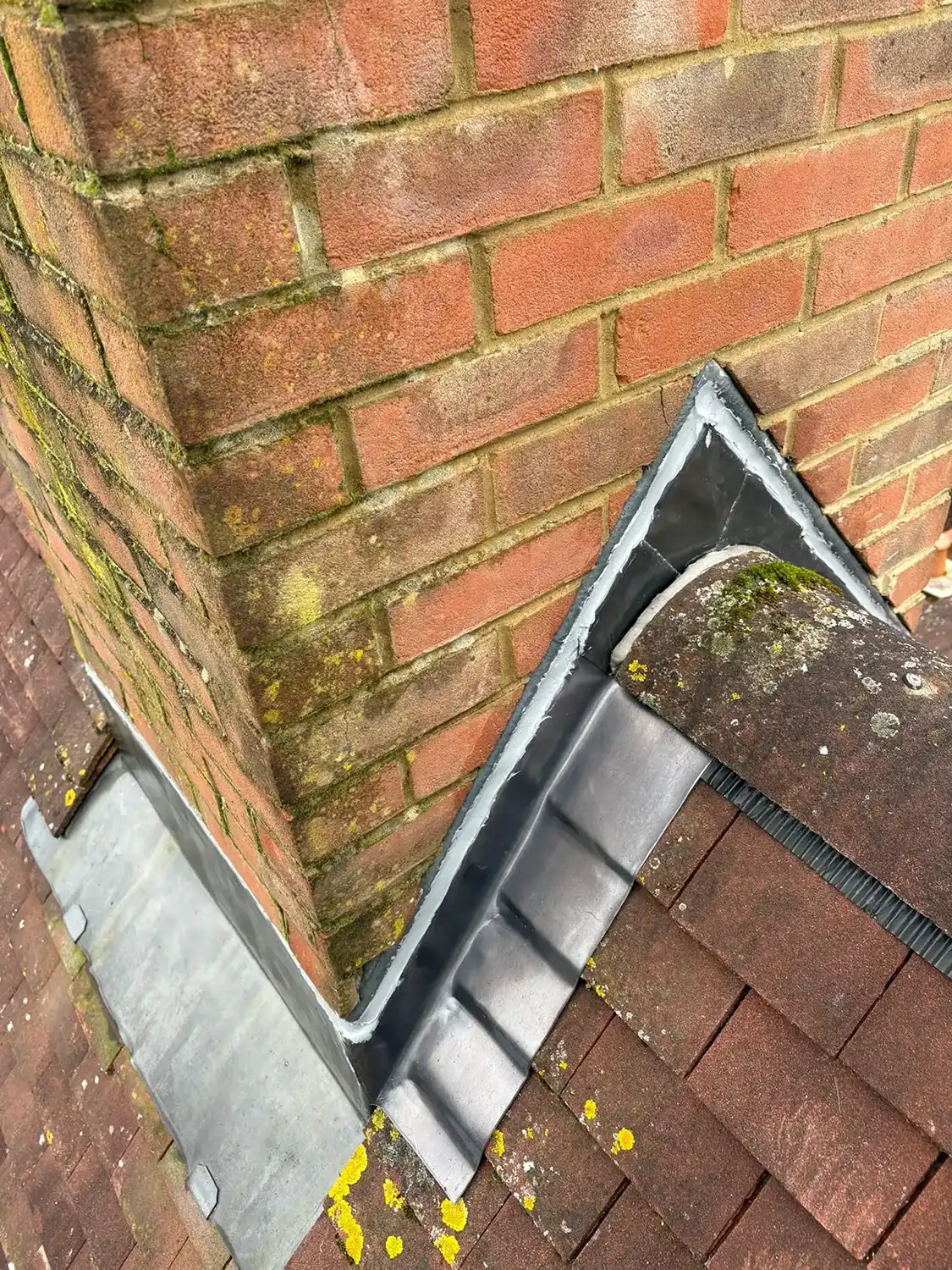 New leadwork on the roof of a house.