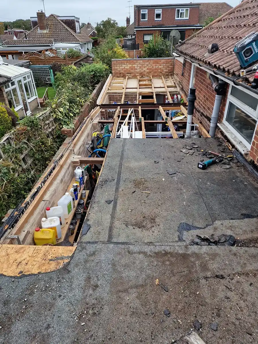 A new flat roof being installed.